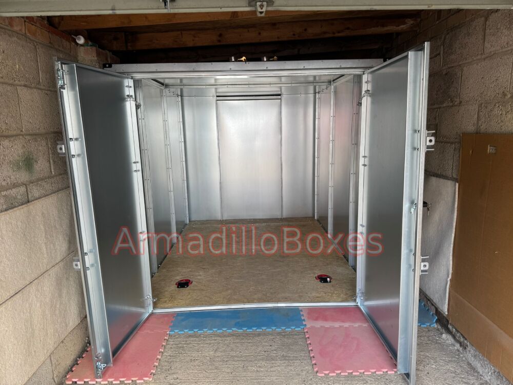 double motorcycle storage shed inside a lockup gararge