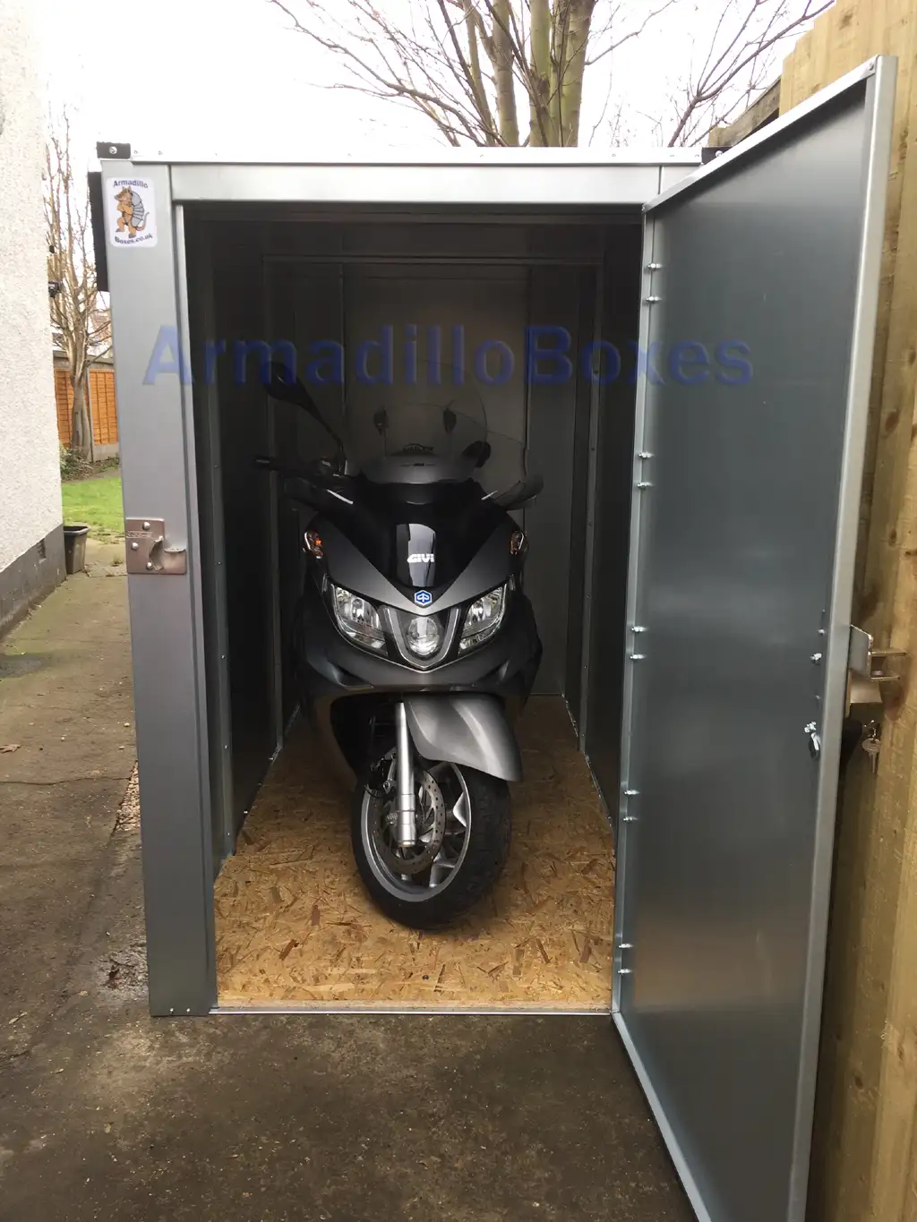 motorbike shed with motorcycle inside