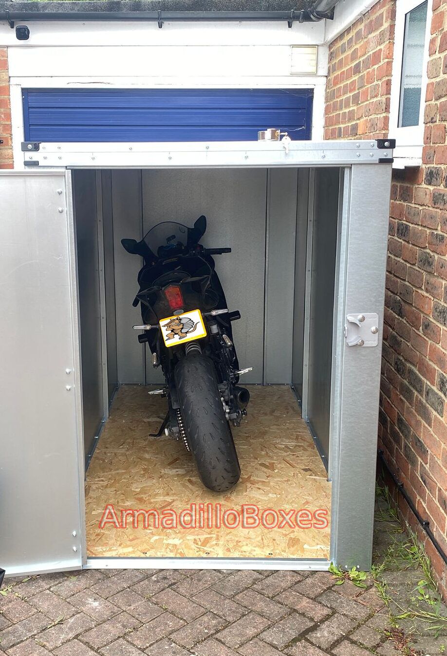 Yamaha R7 stored inside a 5ft high ArmadilloBoxes motorcycle storage shed with galvanised steel construction and secure locking system.