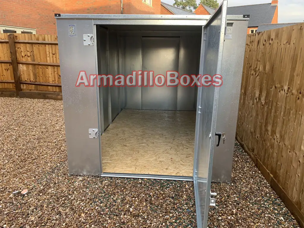 double motorcycle shed on gravel