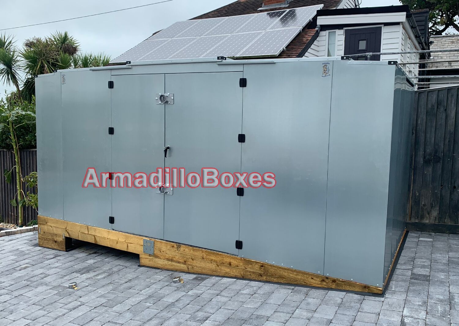 Secure garden shed motorcycle shed doors closed