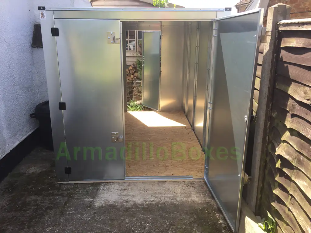 double motorcycle shed with access door in rear