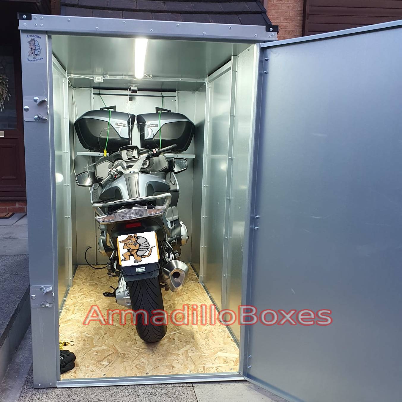 BMW K1200RT stored inside an ArmadilloBoxes secure outdoor motorcycle storage unit